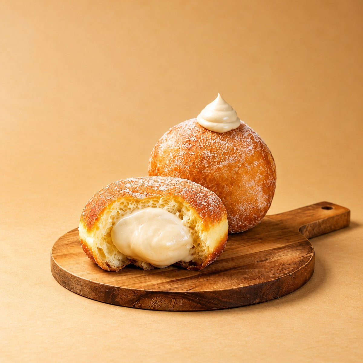 Rhukra Cake House vanilla bombolone doughnut with creamy filling on a wooden board against a beige background